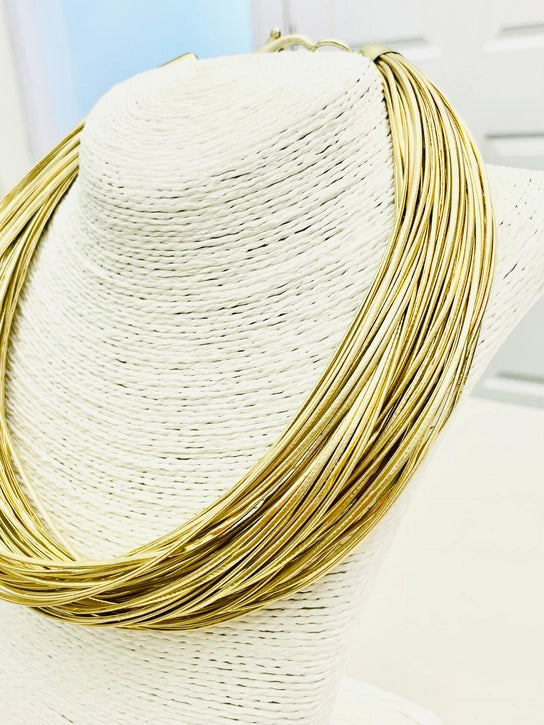 Cece Leatherette Strand Gold